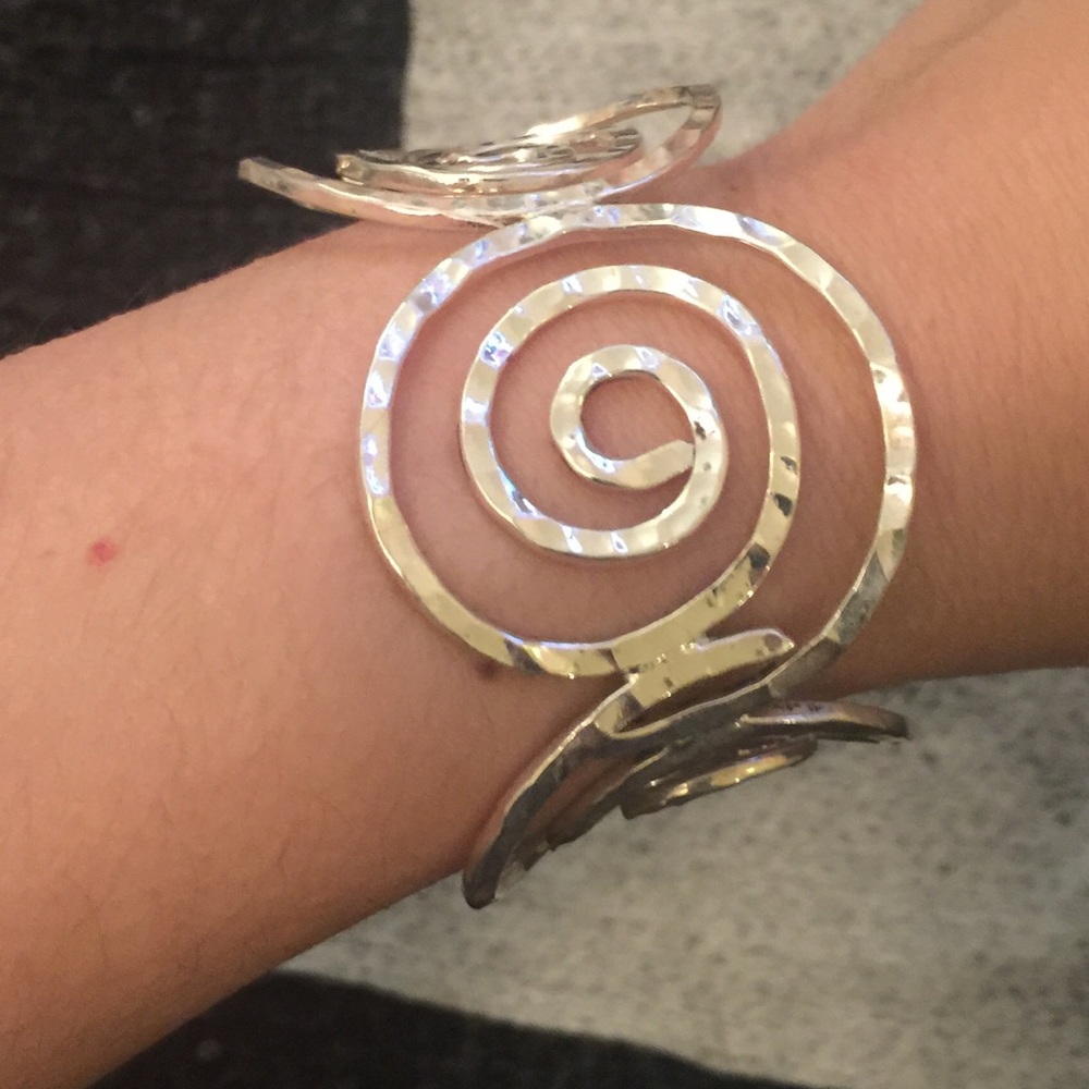 Silvertone swirling whimsical cuff bracelet